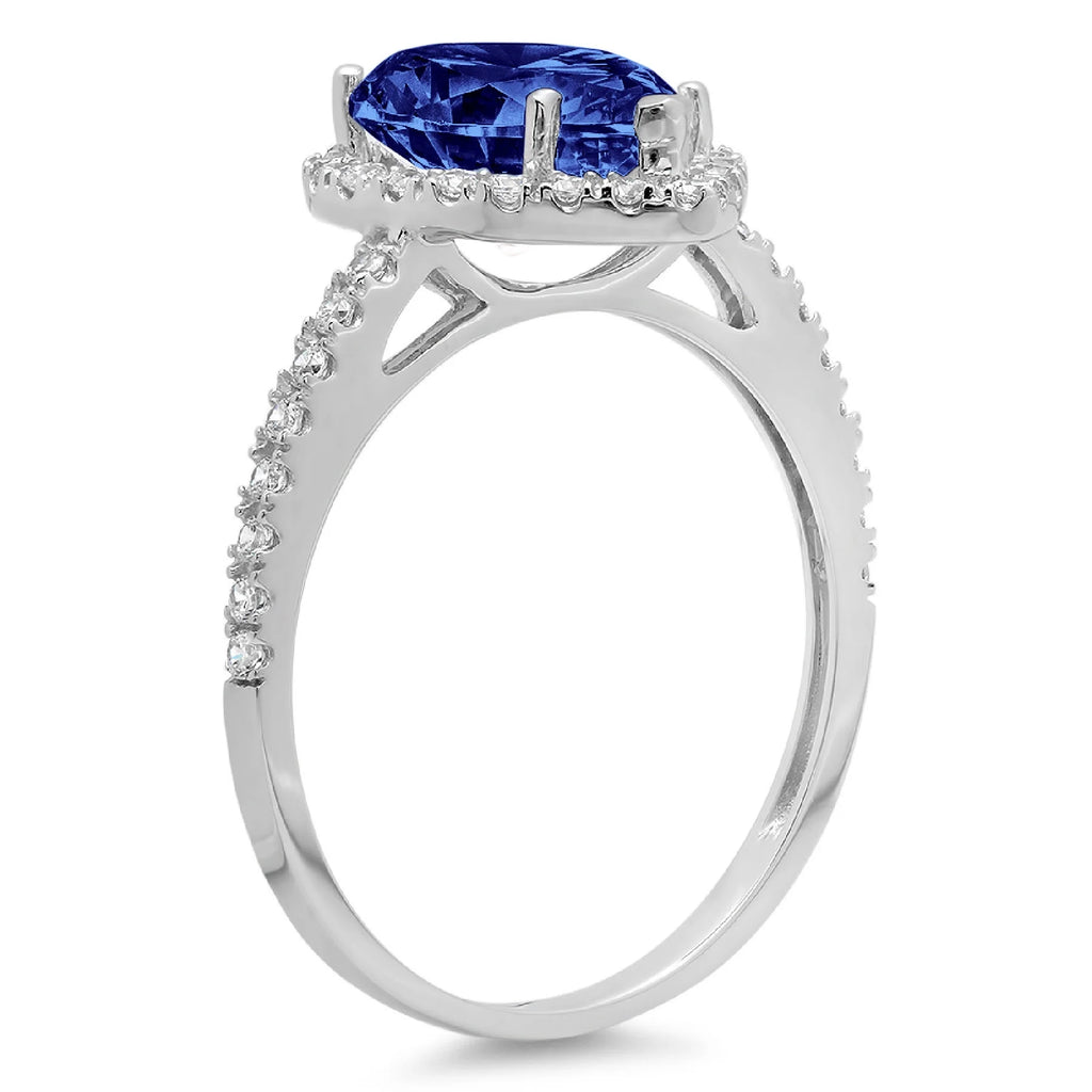 Pear Cut Blue Simulated Tanzanite 18k White Gold Halo Ring X48231